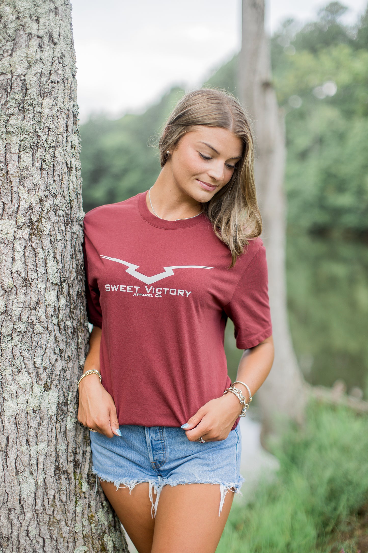 Maroon Romans 8:37 Triumph Tee