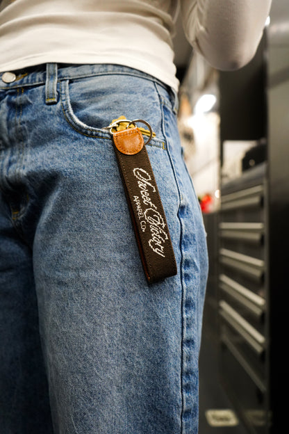 Brown Sweet Victory Needle Point Keychain