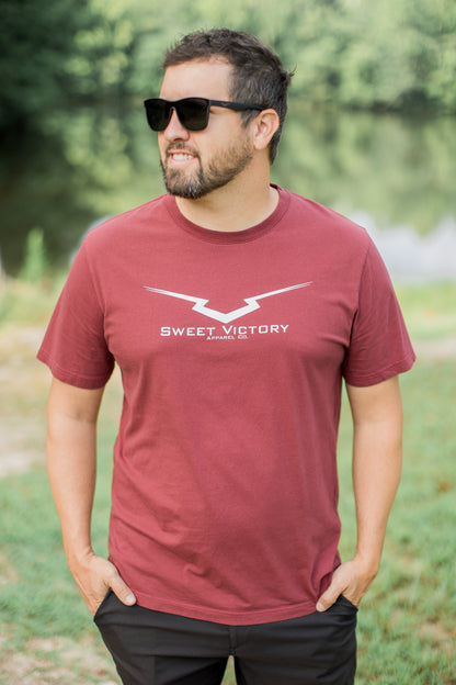 Maroon Romans 8:37 Triumph Tee
