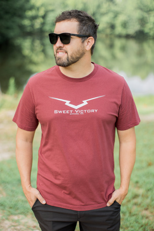 Maroon Romans 8:37 Triumph Tee
